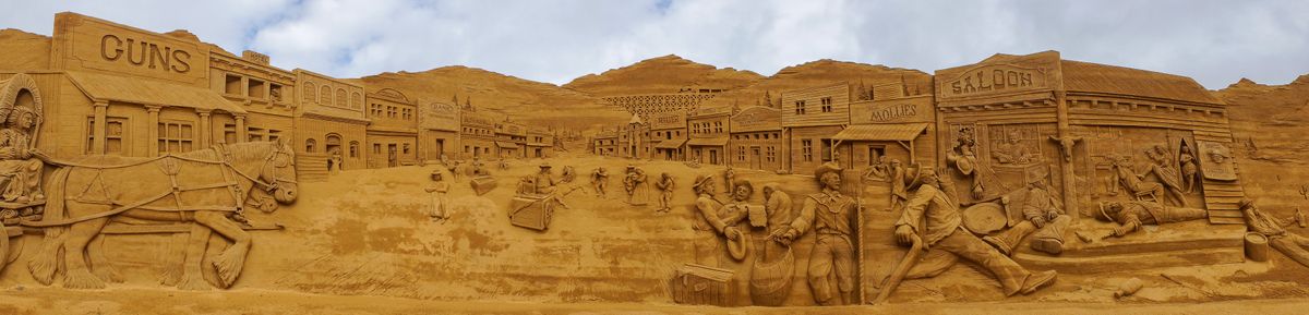 Panorama of the western city at the 2013 international sand sculpture festival in Søndervig, Denmark.